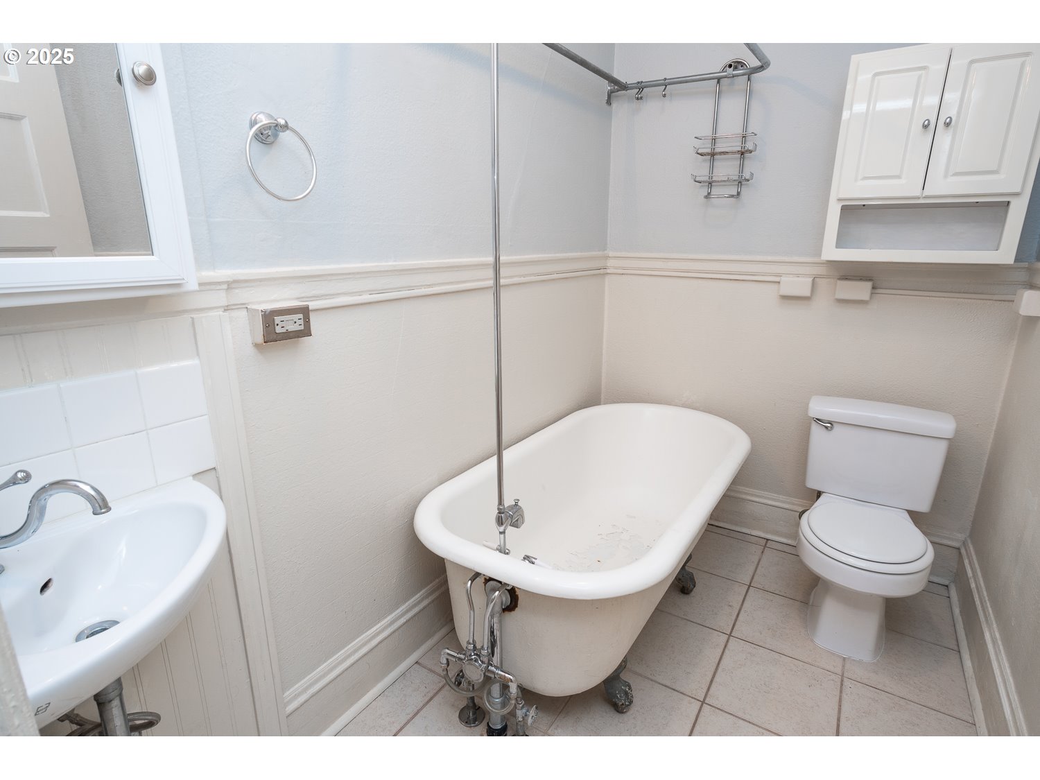 2109 Northwest Irving Street, Unit 407 Portland, OR 97210 - Photo 10 of 17 a bathroom with a sink a toilet and vanity