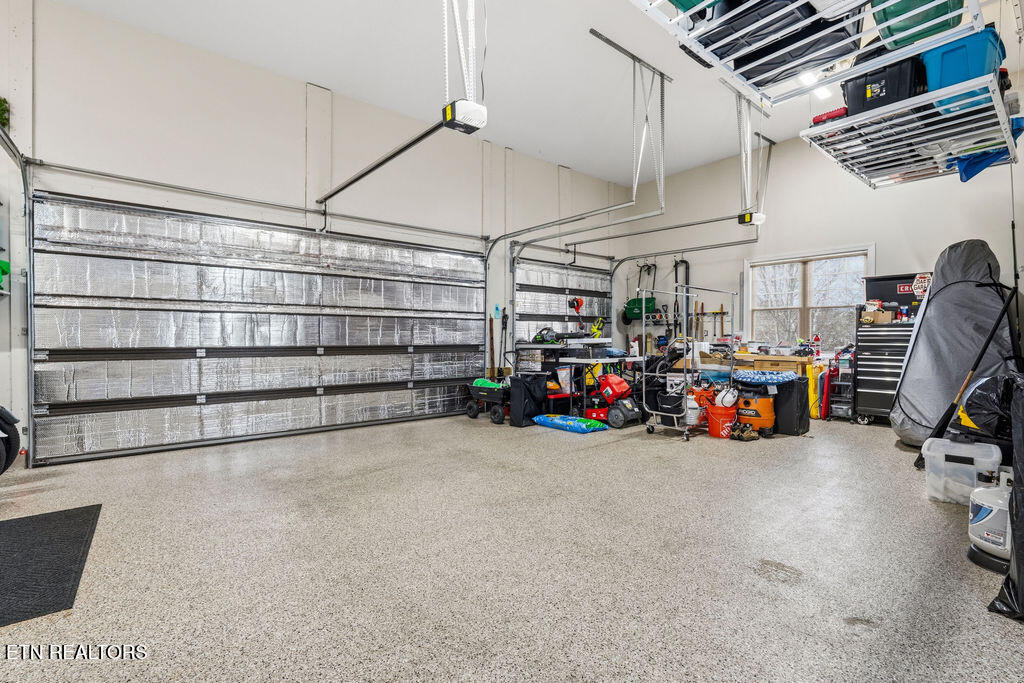179 Oonoga Way Loudon, TN 37774 - Photo 44 of 60 2 Story 3 Car Garage with Epoxy Floors