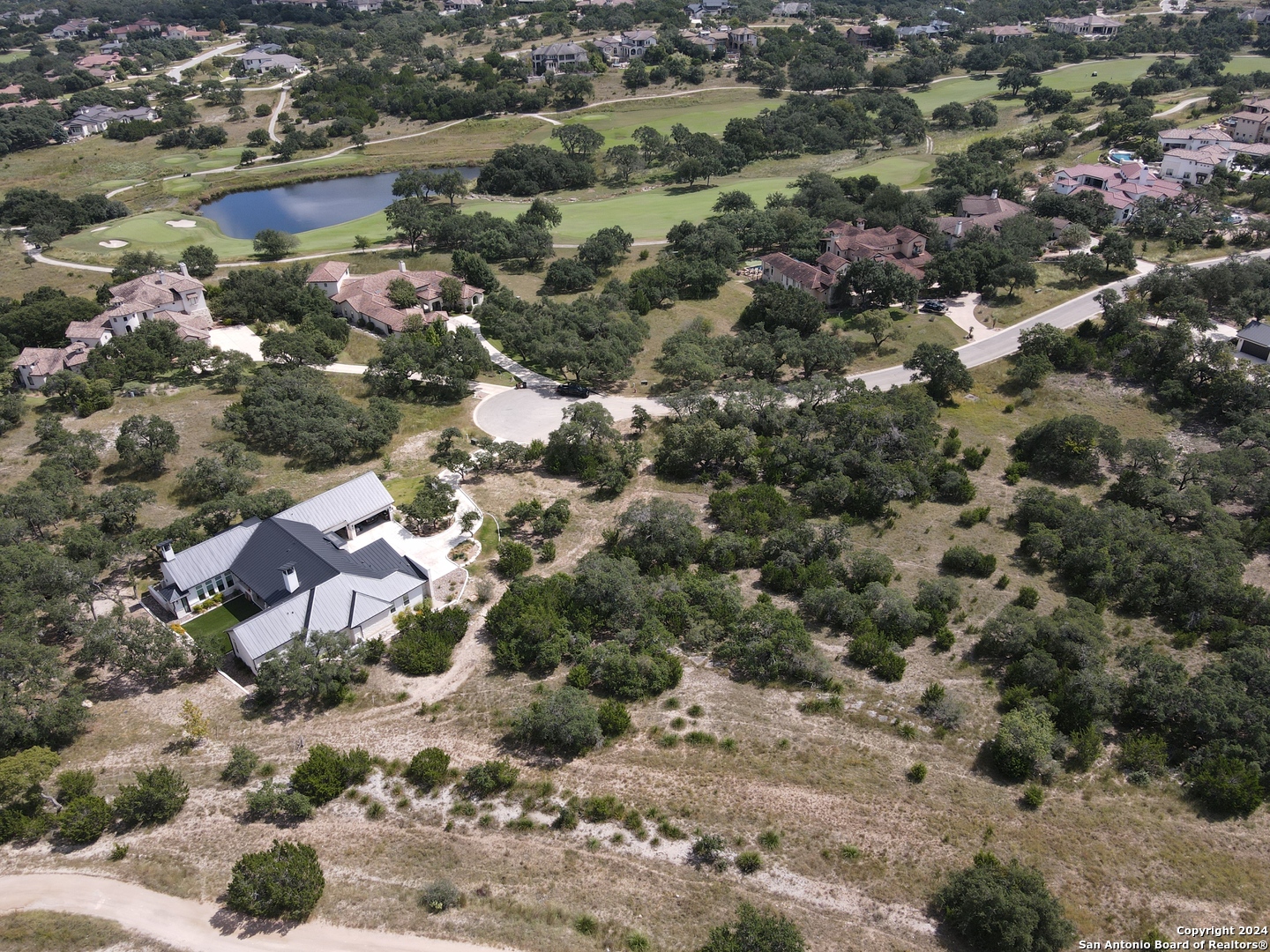 13 Winged Foot Boerne, TX 78006 - Photo 6 of 6 an aerial view of house with yard and mountain view in back