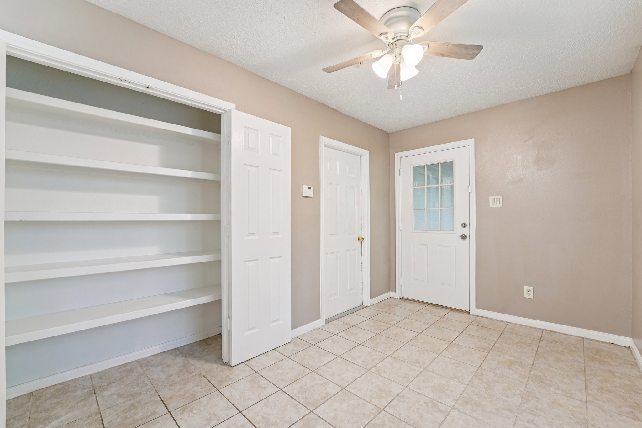 100 Westpark Drive, Unit 5 Conroe, TX 77304 - Photo 8 of 23 a view of an empty room with a window