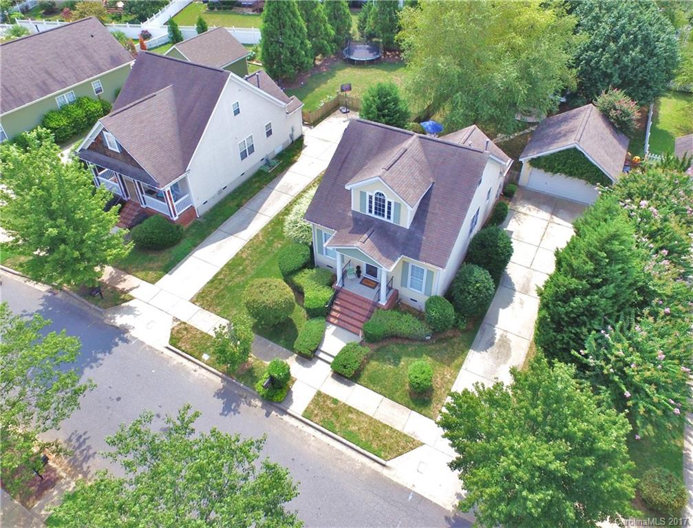 8106 Strandhill Road, Unit 12 Huntersville, NC 28078 - Photo 1 of 24 an aerial view of a house with a yard and garden