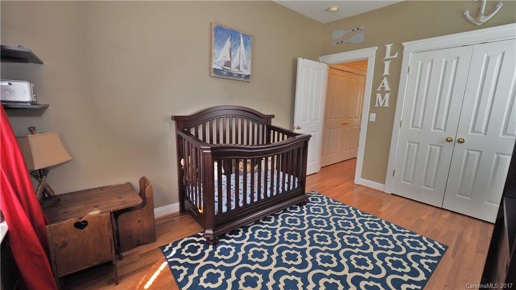 8106 Strandhill Road, Unit 12 Huntersville, NC 28078 - Photo 12 of 24 a view of a hallway with workspace