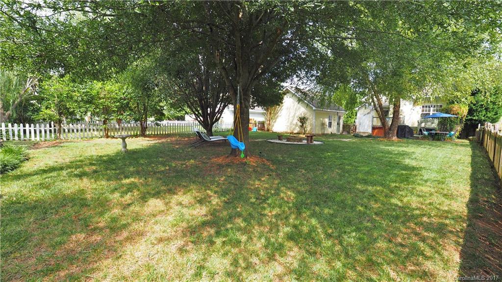 8106 Strandhill Road, Unit 12 Huntersville, NC 28078 - Photo 21 of 24 a view of yard with trees