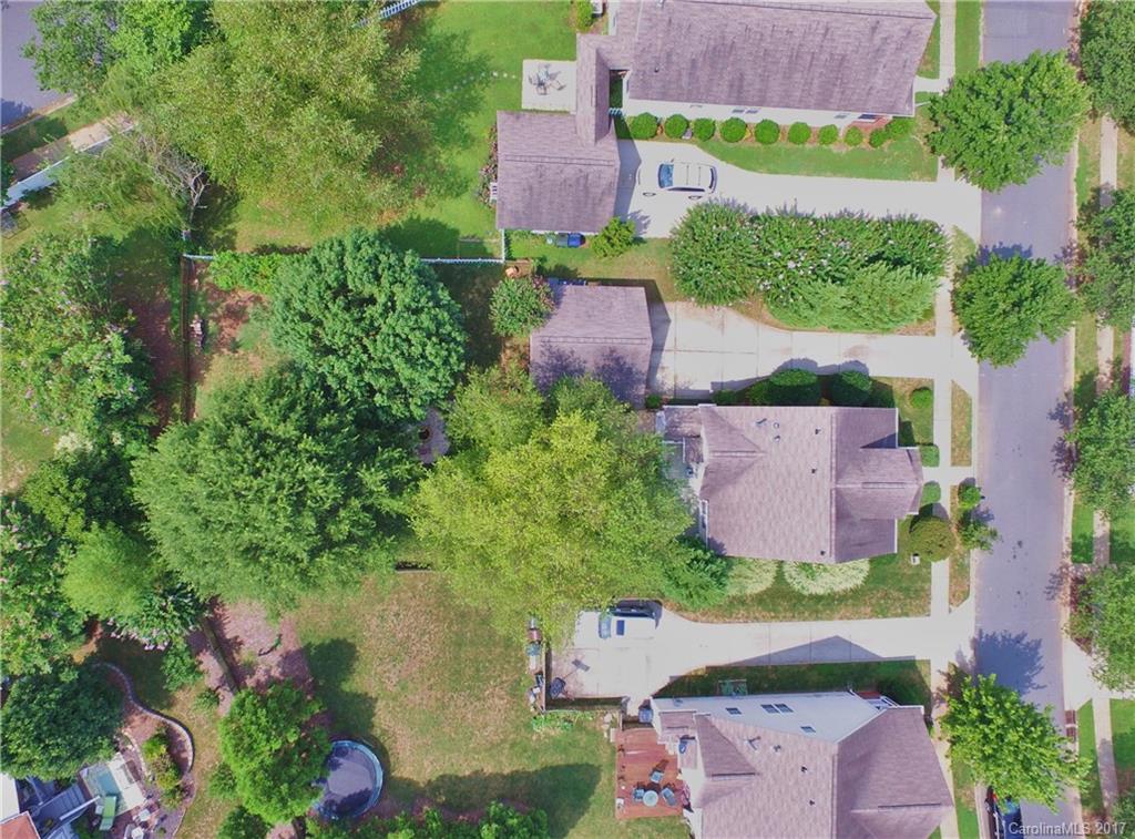 8106 Strandhill Road, Unit 12 Huntersville, NC 28078 - Photo 22 of 24 an aerial view of a house with outdoor space and a lake view