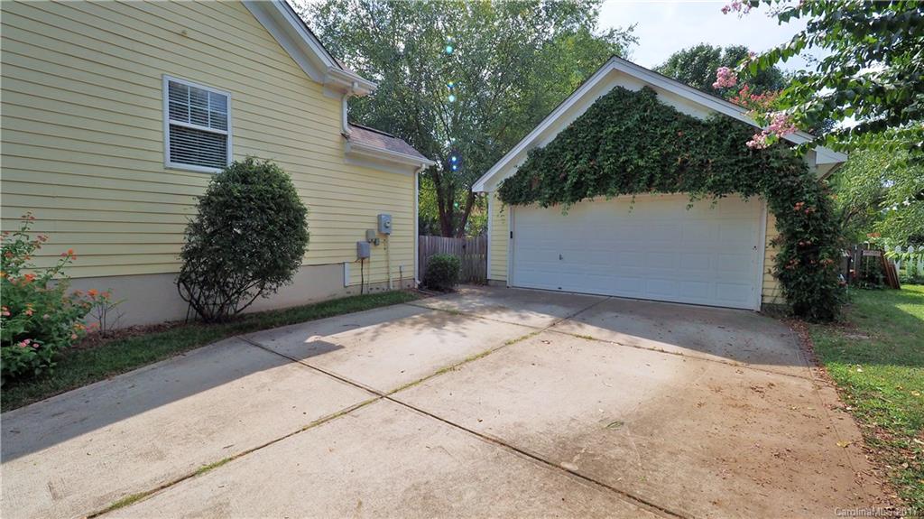 8106 Strandhill Road, Unit 12 Huntersville, NC 28078 - Photo 24 of 24 a view of backyard path with potted plants