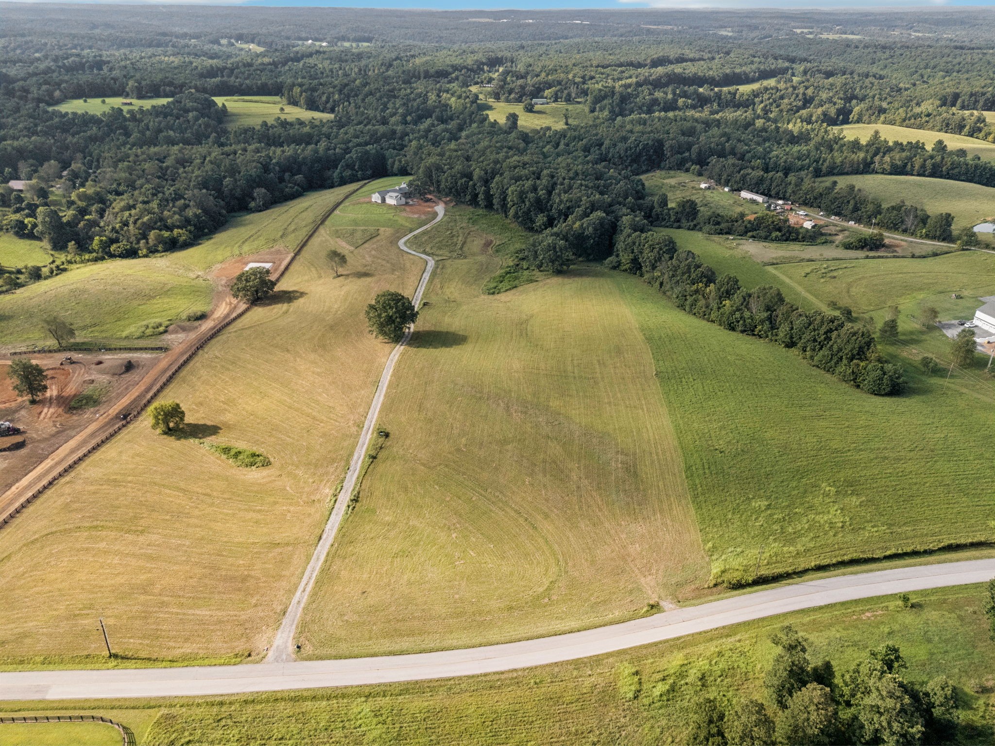 0 West Lick Creek Road Primm Springs, TN 38476 - Photo 12 of 59 an aerial view of residential houses with outdoor space
