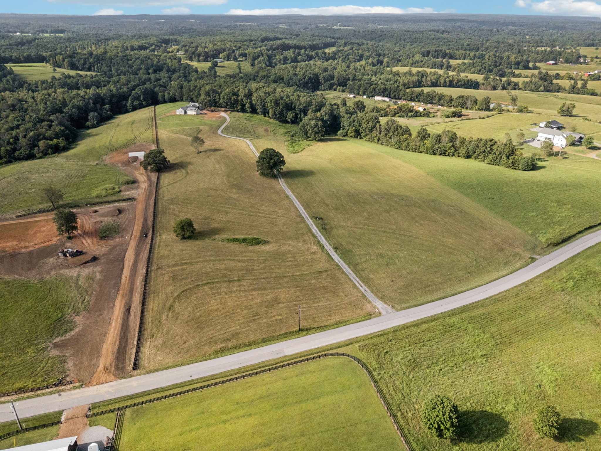 0 West Lick Creek Road Primm Springs, TN 38476 - Photo 4 of 59 an aerial view of a house with a yard
