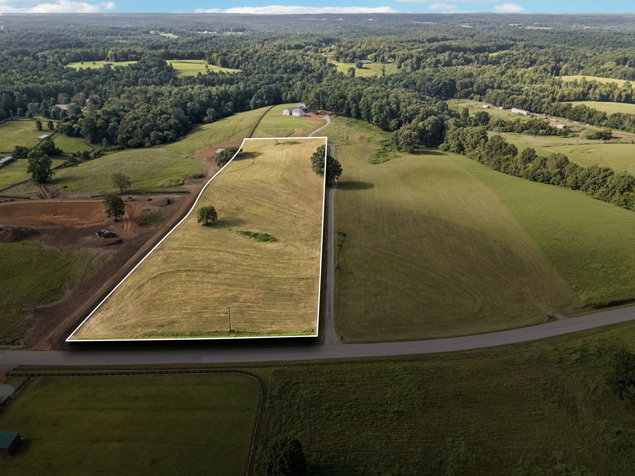 0 West Lick Creek Road Primm Springs, TN 38476 - Photo 55 of 59 an aerial view of residential houses with outdoor space
