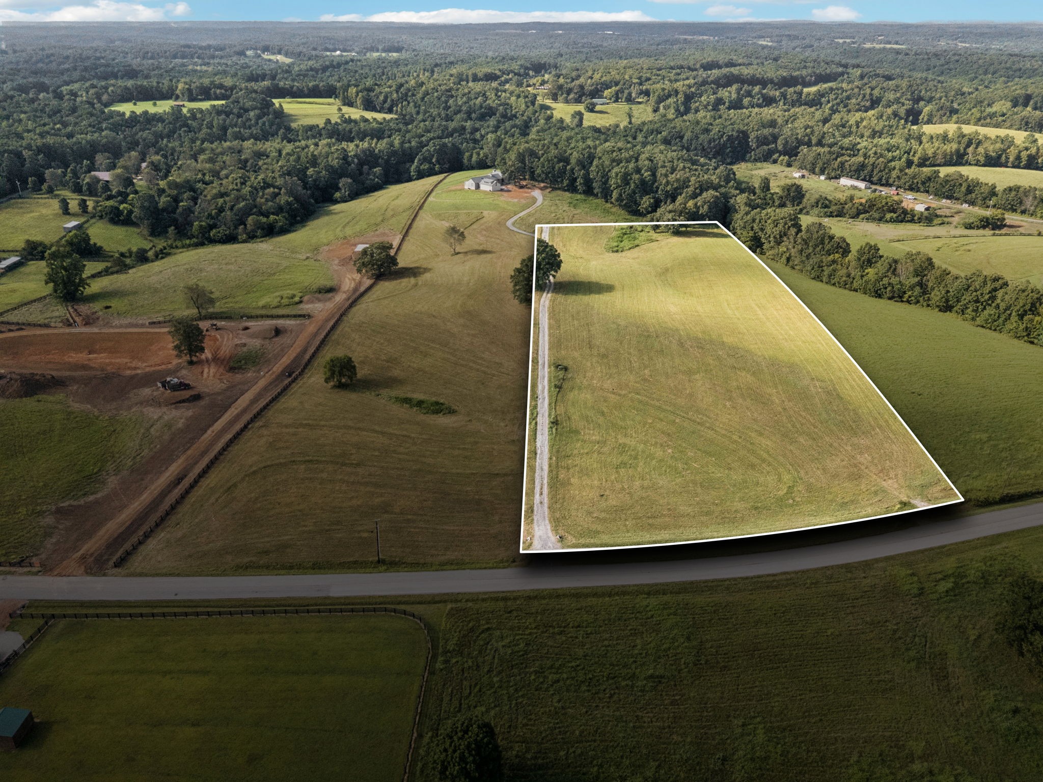 0 West Lick Creek Road Primm Springs, TN 38476 - Photo 56 of 59 an aerial view of residential houses with outdoor space and ocean view