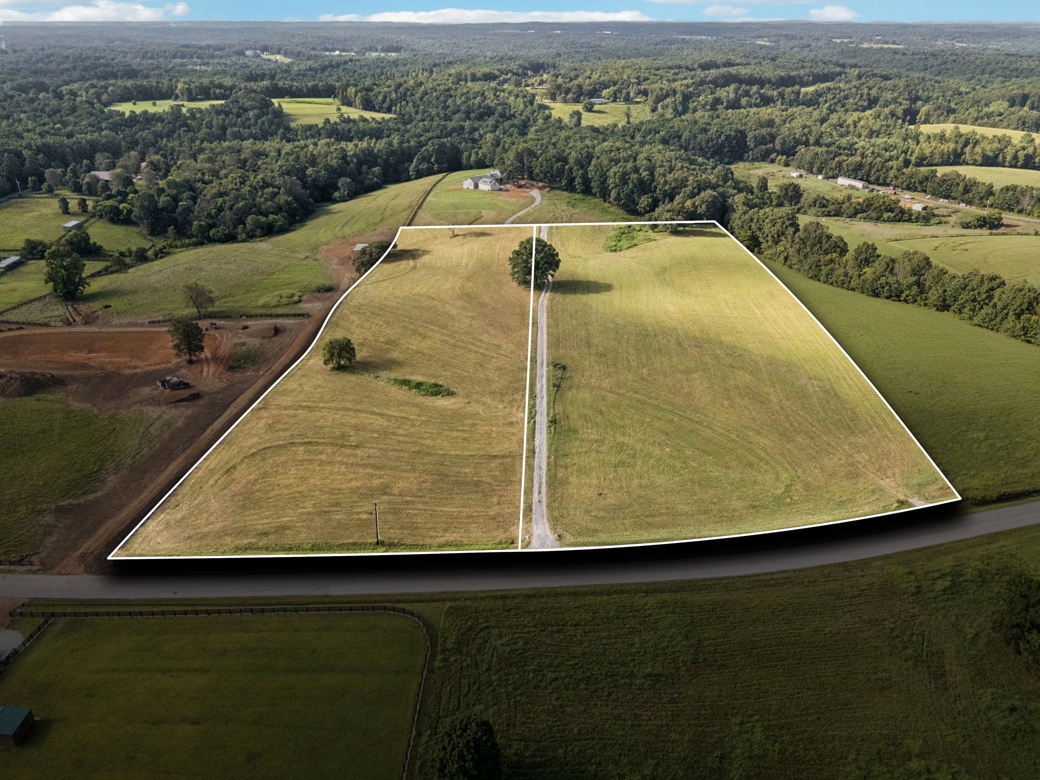 0 West Lick Creek Road Primm Springs, TN 38476 - Photo 57 of 59 an aerial view of residential houses with outdoor space