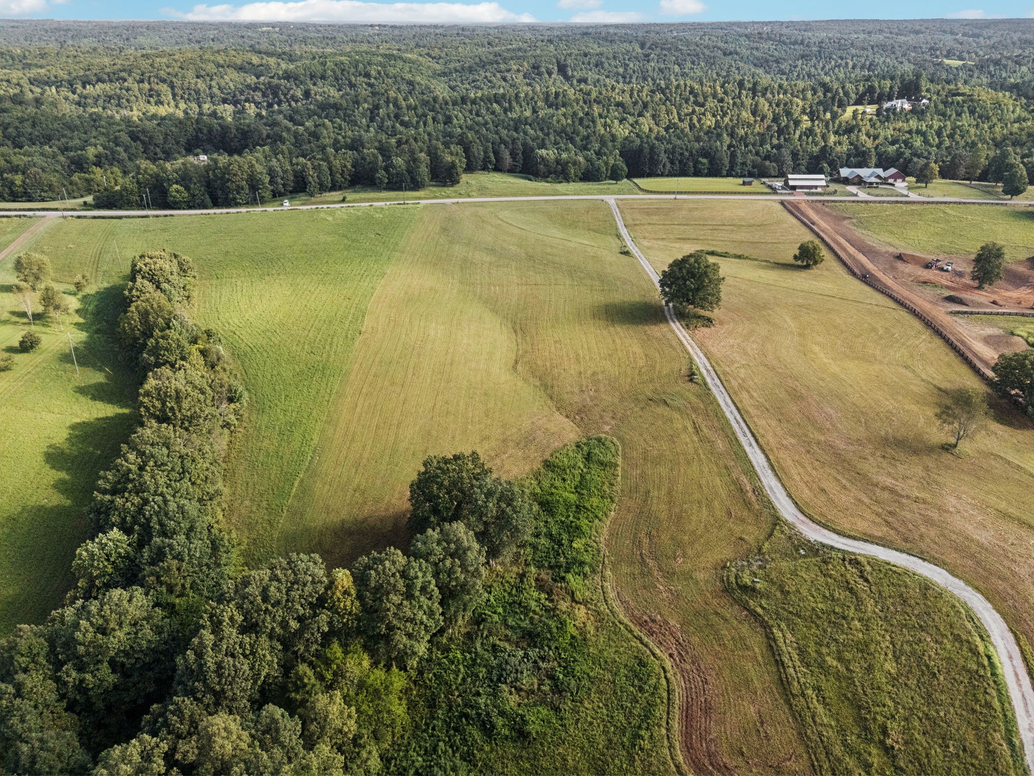 0 West Lick Creek Road Primm Springs, TN 38476 - Photo 9 of 59 an aerial view of a residential houses with outdoor space and river