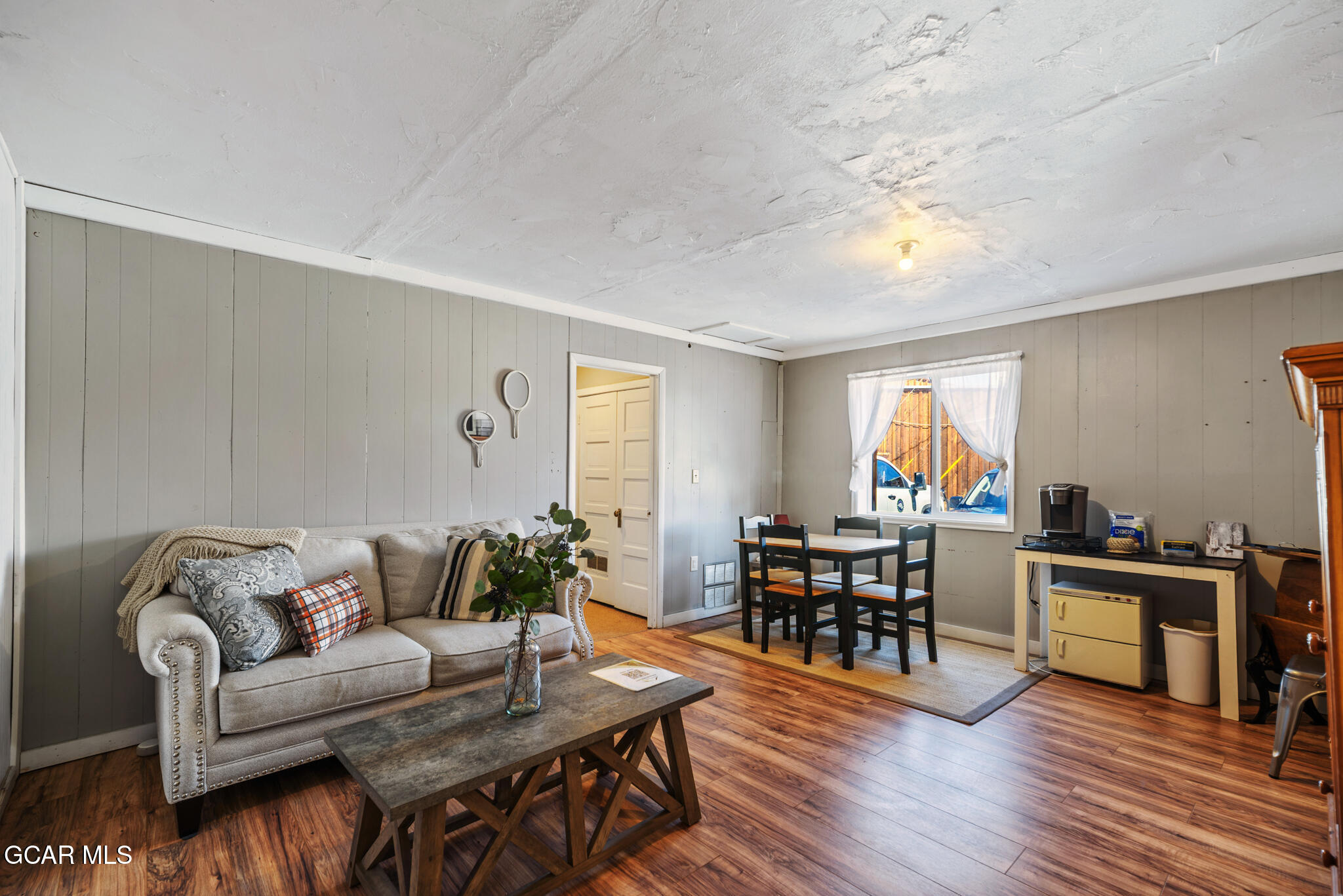 104 3rd Street Kremmling, CO 80459 - Photo 20 of 71 a living room with furniture and wooden floor