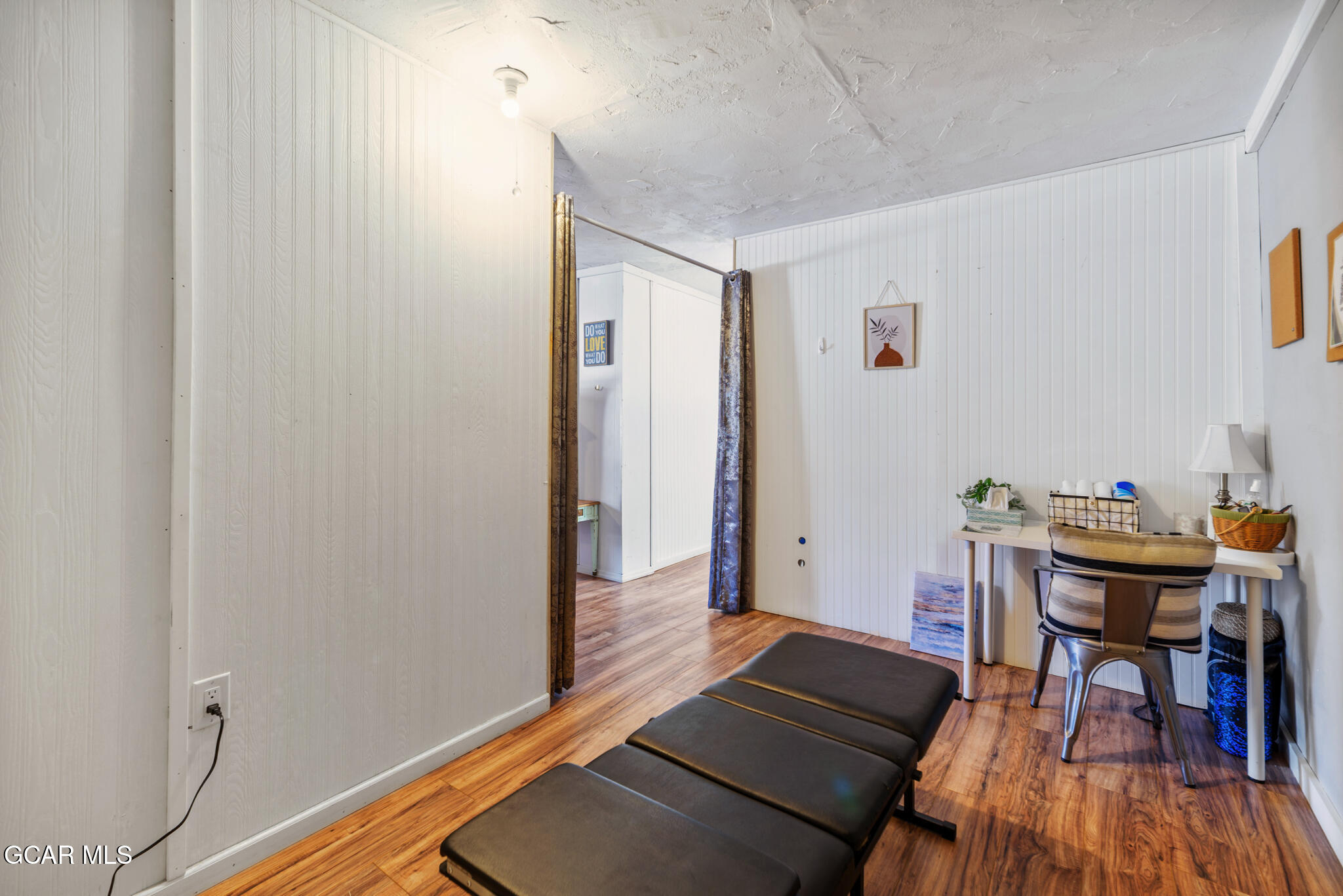 104 3rd Street Kremmling, CO 80459 - Photo 23 of 71 a view of a livingroom with furniture and wooden floor