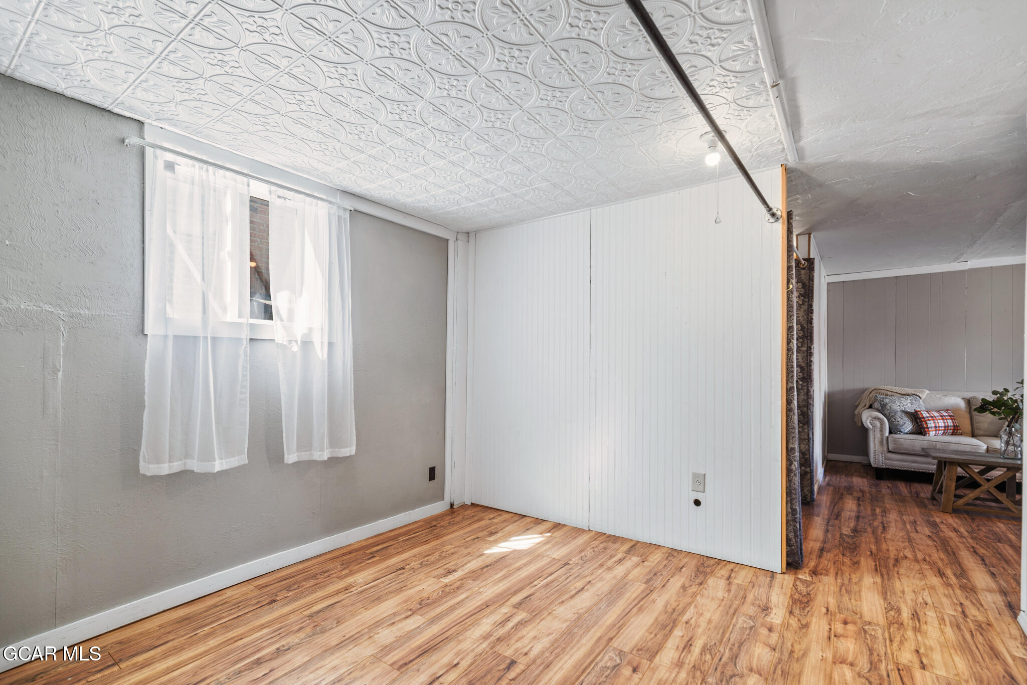 104 3rd Street Kremmling, CO 80459 - Photo 25 of 71 a view of a livingroom with wooden floor and a window