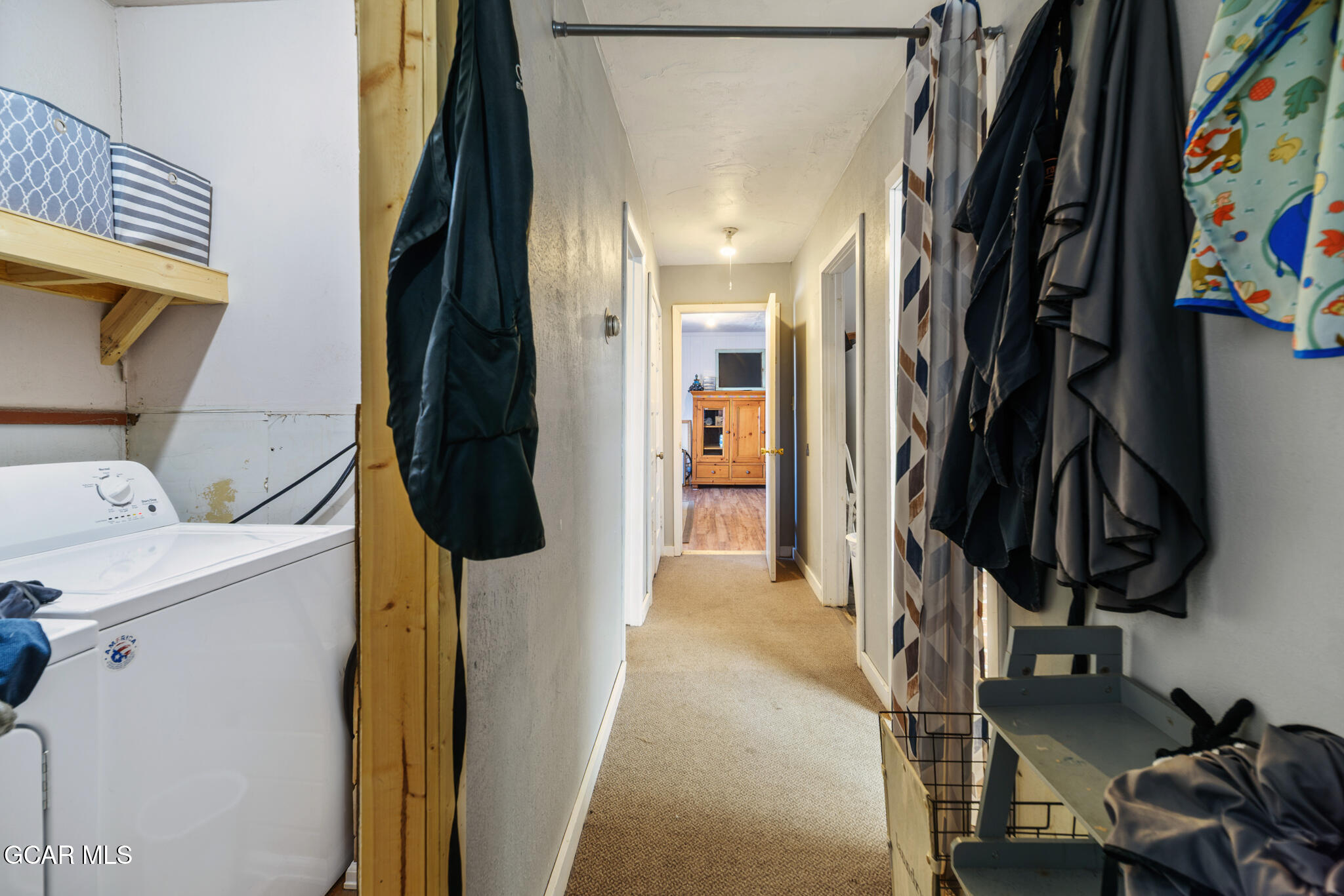 104 3rd Street Kremmling, CO 80459 - Photo 35 of 71 a view of walk in closet with clothes and shoes