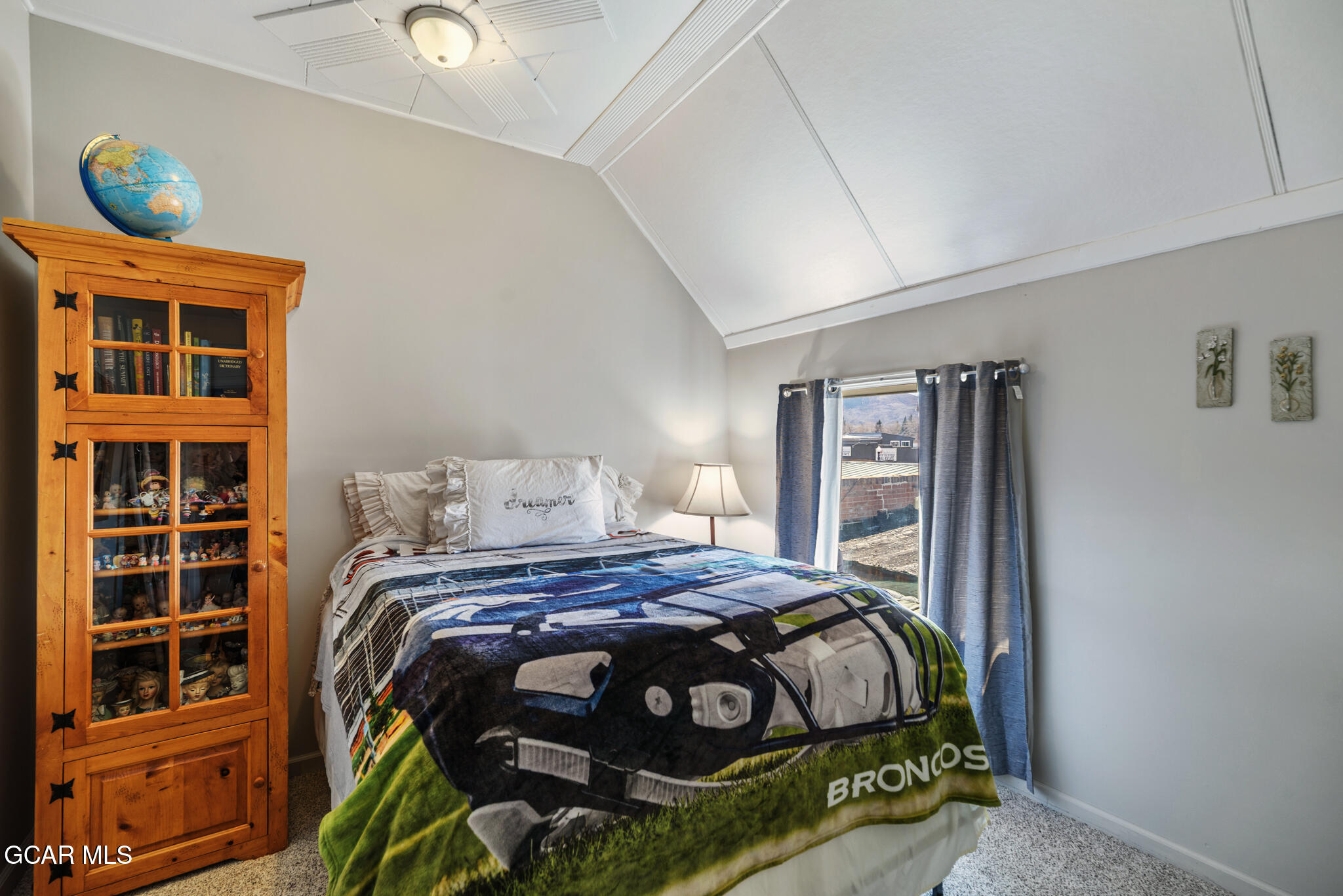 104 3rd Street Kremmling, CO 80459 - Photo 53 of 71 a bedroom with a bed and a window