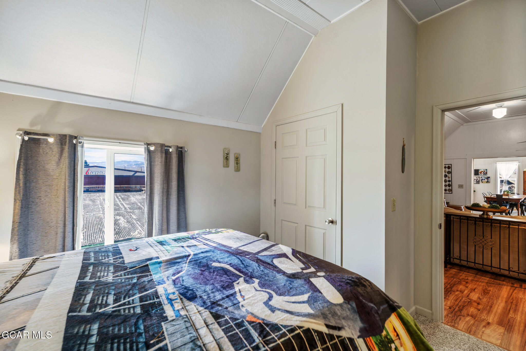 104 3rd Street Kremmling, CO 80459 - Photo 54 of 71 a bedroom with a bed and a dresser