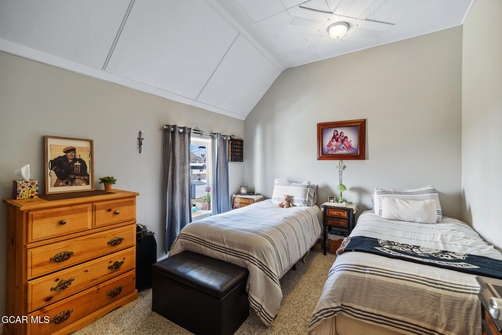 104 3rd Street Kremmling, CO 80459 - Photo 56 of 71 a bedroom with a bed and dresser