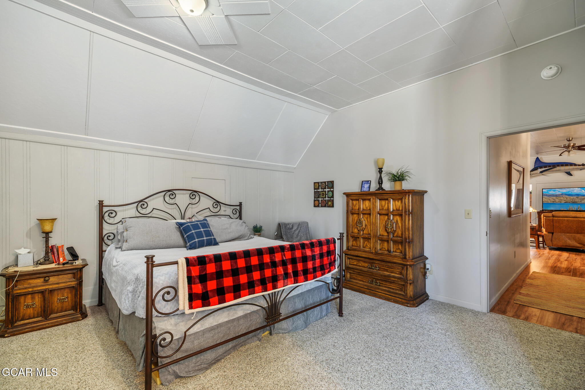 104 3rd Street Kremmling, CO 80459 - Photo 59 of 71 a bedroom with a bed and a couch