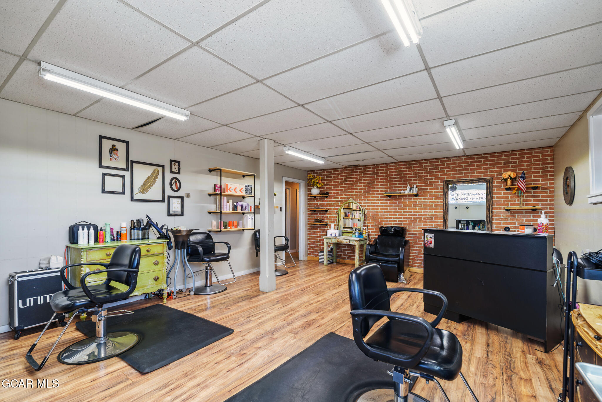 104 3rd Street Kremmling, CO 80459 - Photo 6 of 71 a view of a workspace with furniture and a livingroom
