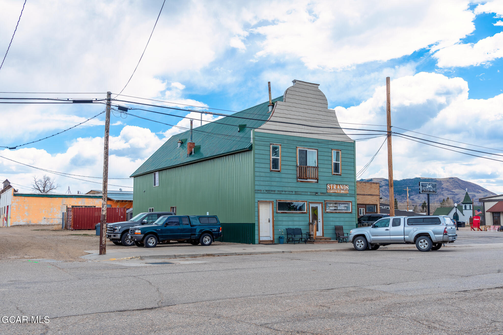 104 3rd Street Kremmling, CO 80459 - Photo 69 of 71 a car parked in front of a building