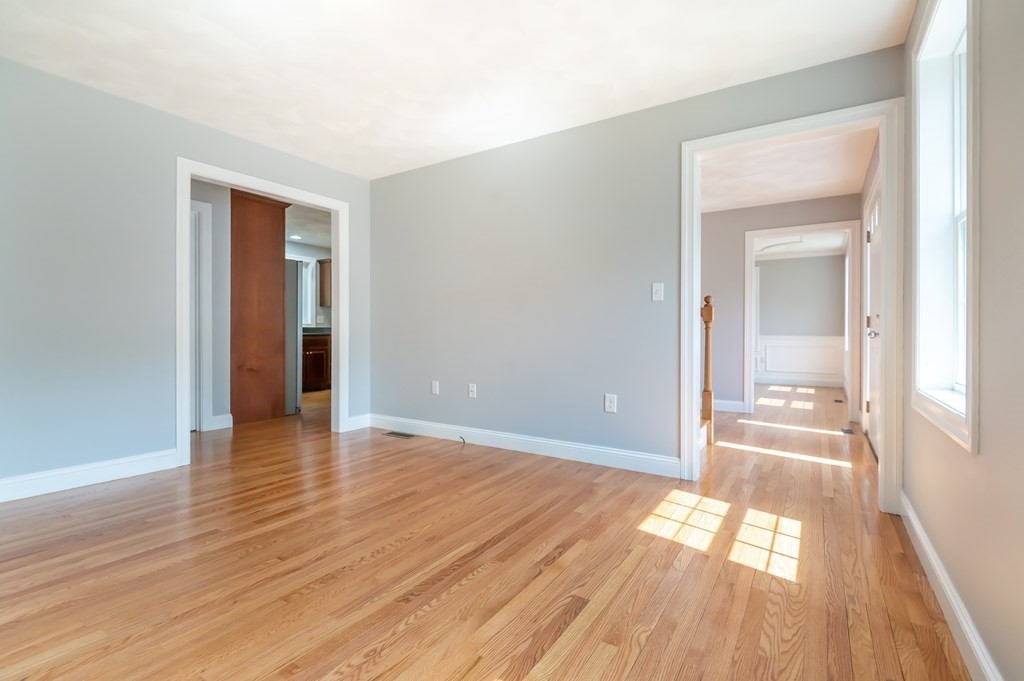 12 Bell Road Tewksbury, MA 01876 - Photo 13 of 26 a view of a room with wooden floor and a bathroom