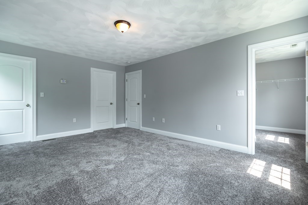 12 Bell Road Tewksbury, MA 01876 - Photo 17 of 26 a view of an empty room