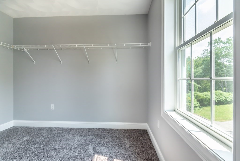 12 Bell Road Tewksbury, MA 01876 - Photo 19 of 26 a view of an empty room with a window
