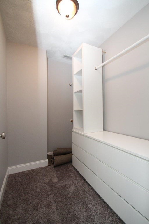 12 Bell Road Tewksbury, MA 01876 - Photo 25 of 26 a bathroom with a window and a shower