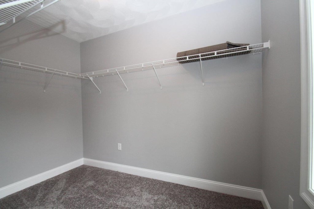 12 Bell Road Tewksbury, MA 01876 - Photo 26 of 26 a view of a room with racks on the wall