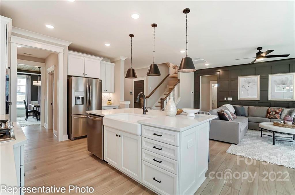 2345 Windley Drive Gastonia, NC 28054 - Photo 13 of 32 a view of a kitchen with kitchen island a counter top space appliances and cabinets