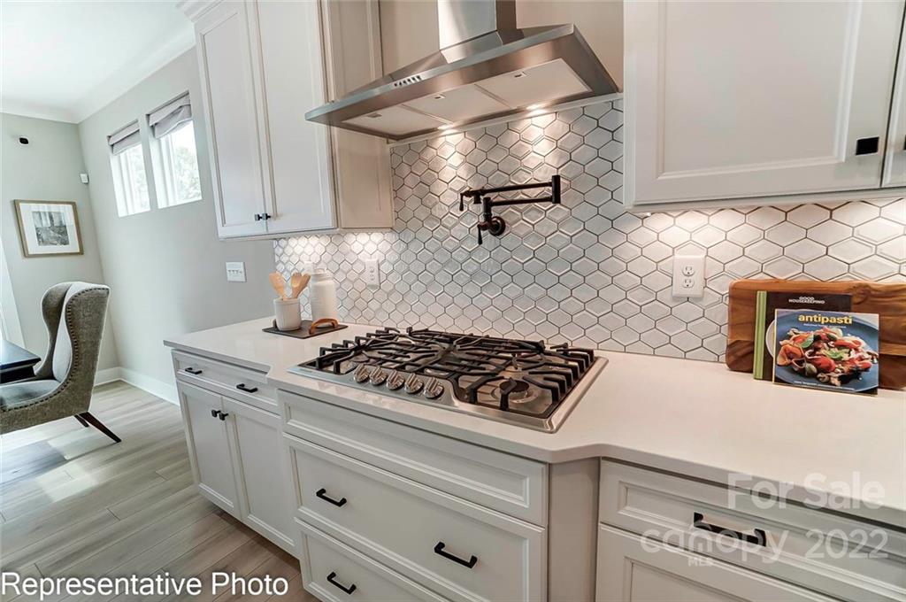 2345 Windley Drive Gastonia, NC 28054 - Photo 15 of 32 a stove top oven sitting inside of a kitchen