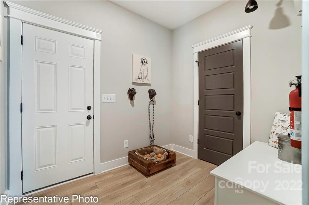 2345 Windley Drive Gastonia, NC 28054 - Photo 21 of 32 a bedroom with a bed and a dresser