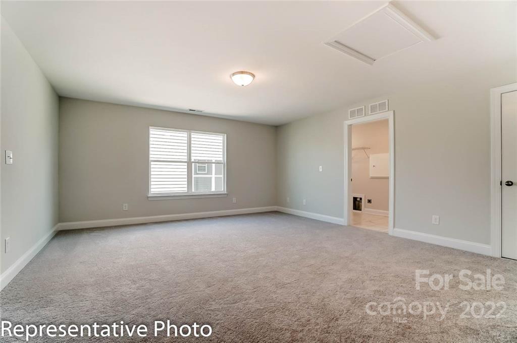 2345 Windley Drive Gastonia, NC 28054 - Photo 25 of 32 an empty room with windows
