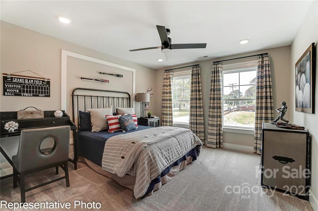 2345 Windley Drive Gastonia, NC 28054 - Photo 29 of 32 a bedroom with a bed and a large window