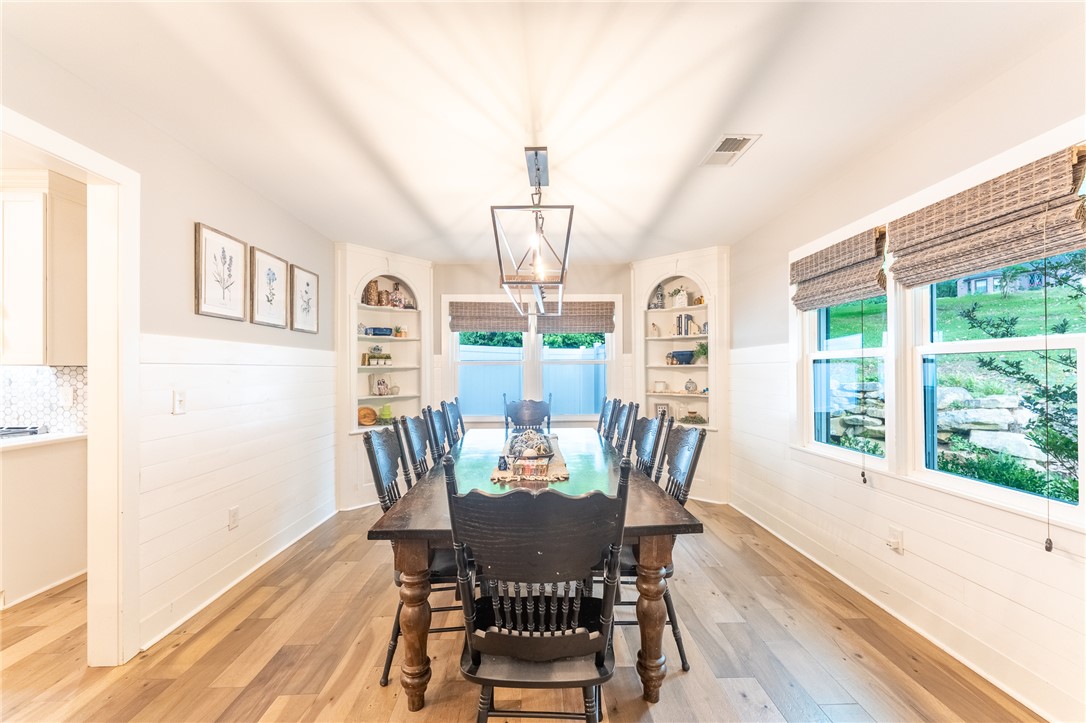 103 Riggs Drive Clemson, SC 29631 - Photo 6 of 50 Elegant hardwood flooring enhances this dining room, perfect for memorable gatherings.