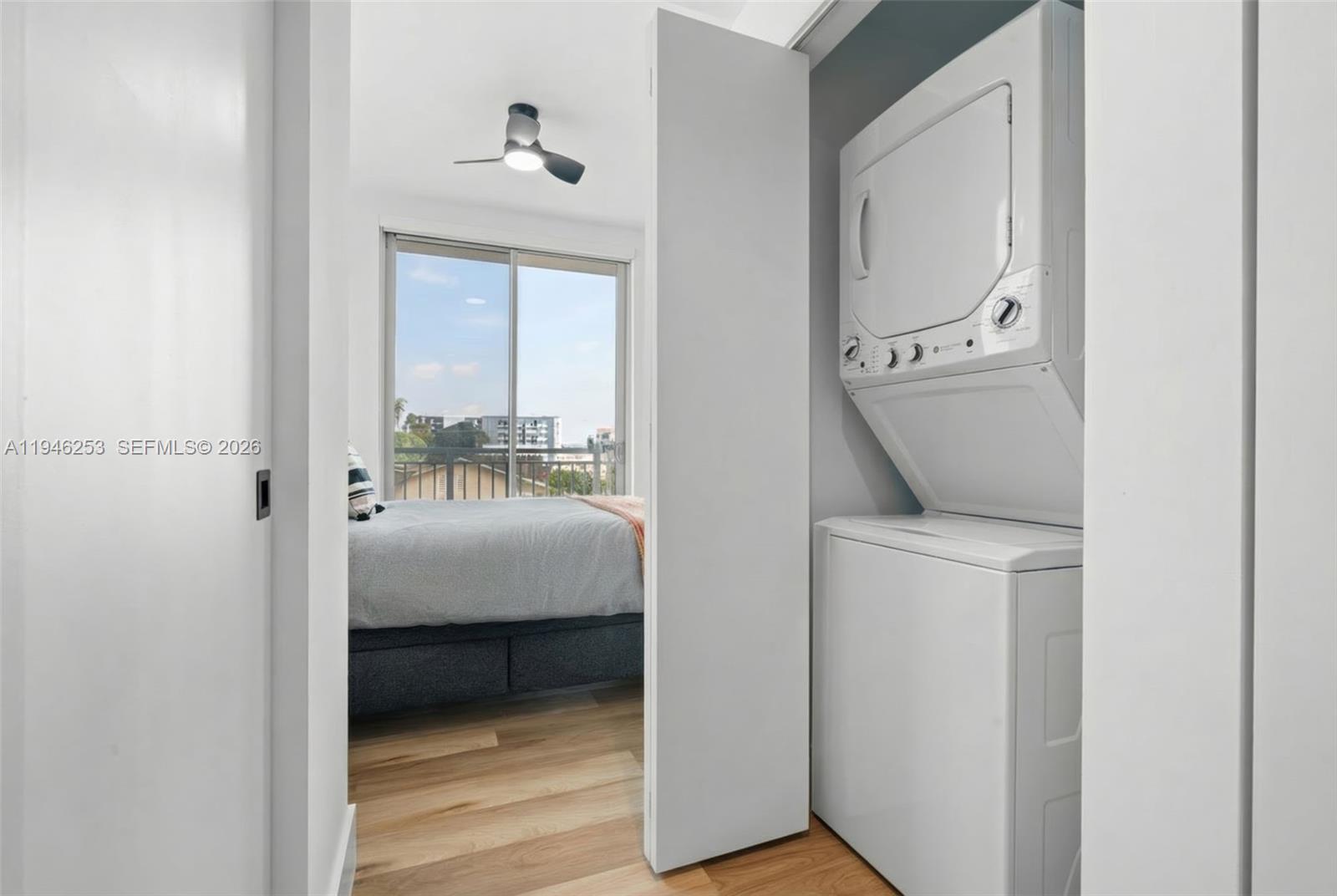 650 Southwest 1st Street, Unit 305 Miami, FL 33130 - Photo 21 of 28 a view of hallway with washer and dryer