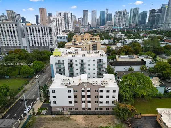 a view of a city with tall buildings