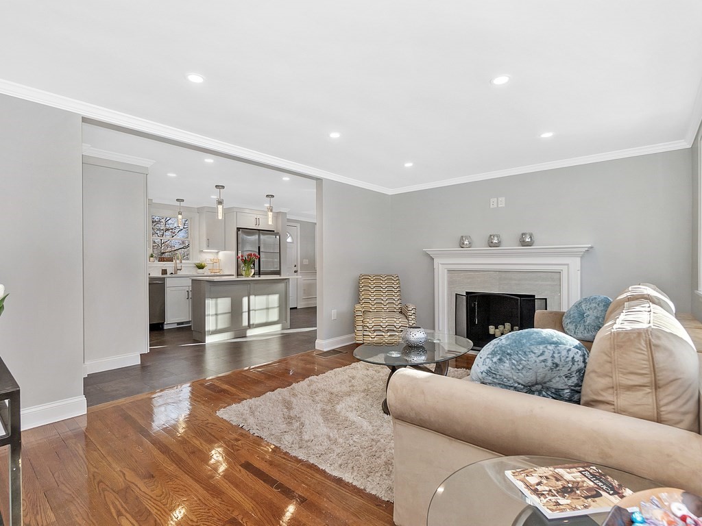 46 Shawsheen Road Billerica, MA 01821 - Photo 2 of 18 a living room with furniture and a fireplace