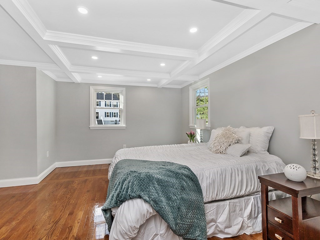 46 Shawsheen Road Billerica, MA 01821 - Photo 6 of 18 a bedroom with a bed and wooden floor