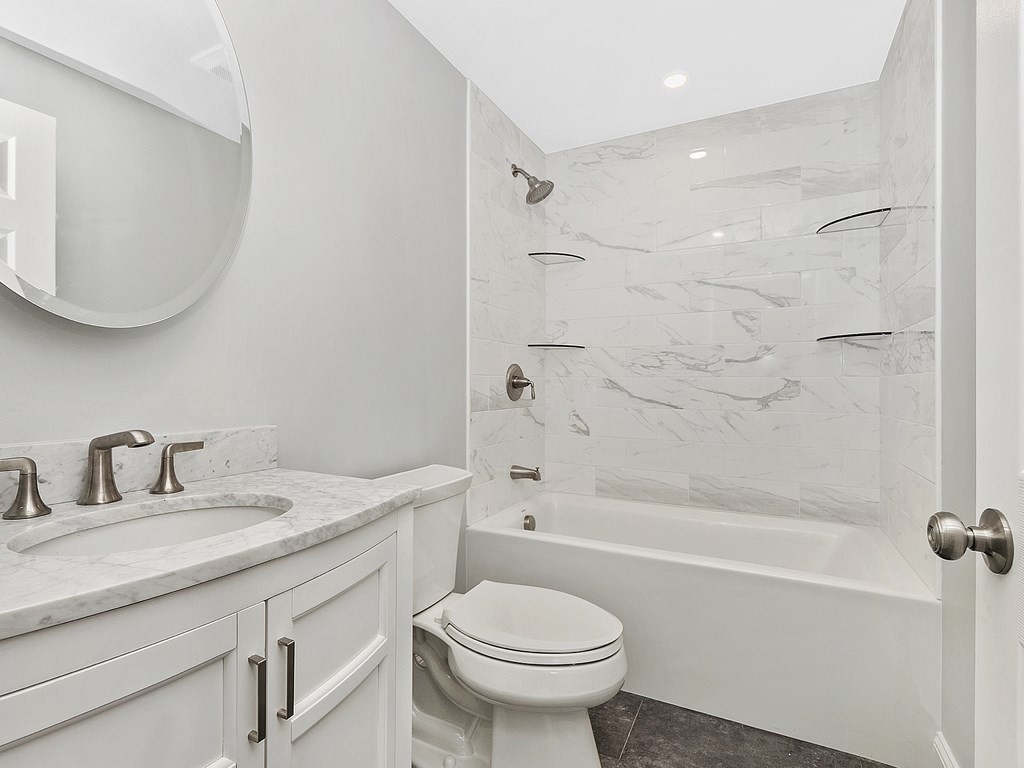 46 Shawsheen Road Billerica, MA 01821 - Photo 8 of 18 a bathroom with a sink toilet and shower