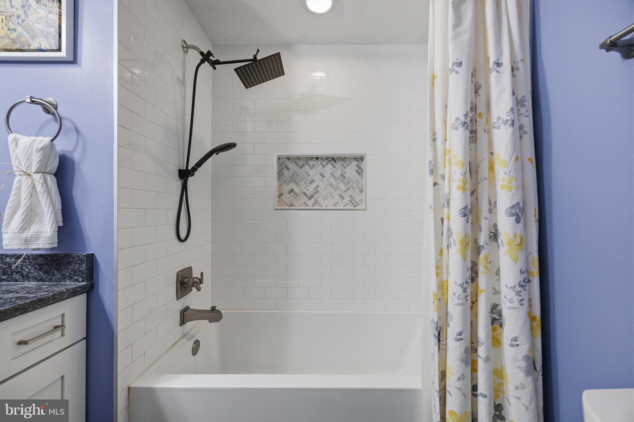 1506 Gollum Road Hanover, MD 21076 - Photo 27 of 44 a bathroom with a bathtub and shower