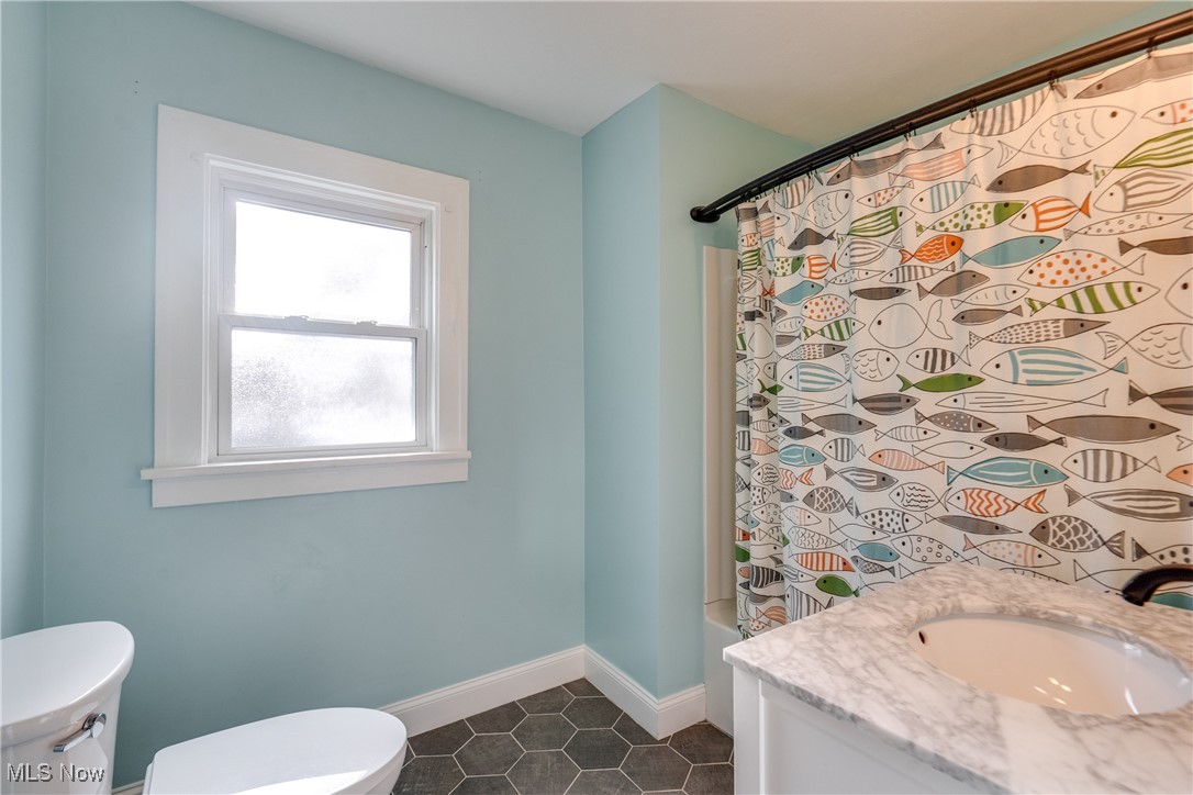 3130 Corydon Road Cleveland, OH 44118 - Photo 25 of 44 Bathroom featuring tile patterned floors, toilet, and vanity