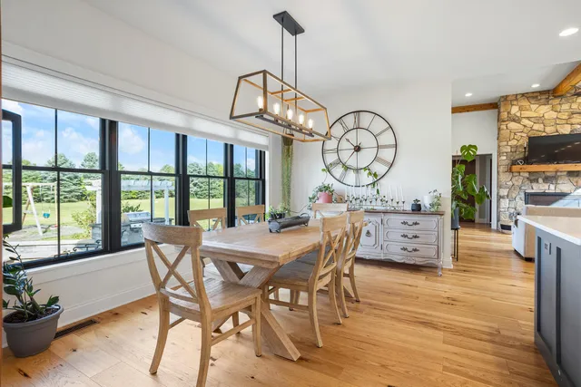 a bedroom with a bed and a flat tv screen