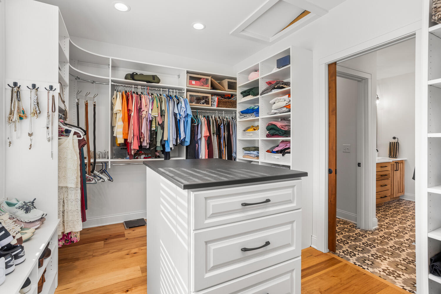 1335 2250 East St. Joseph, IL 61873 - Photo 28 of 68 a view of walk in closet with clothes and shoes