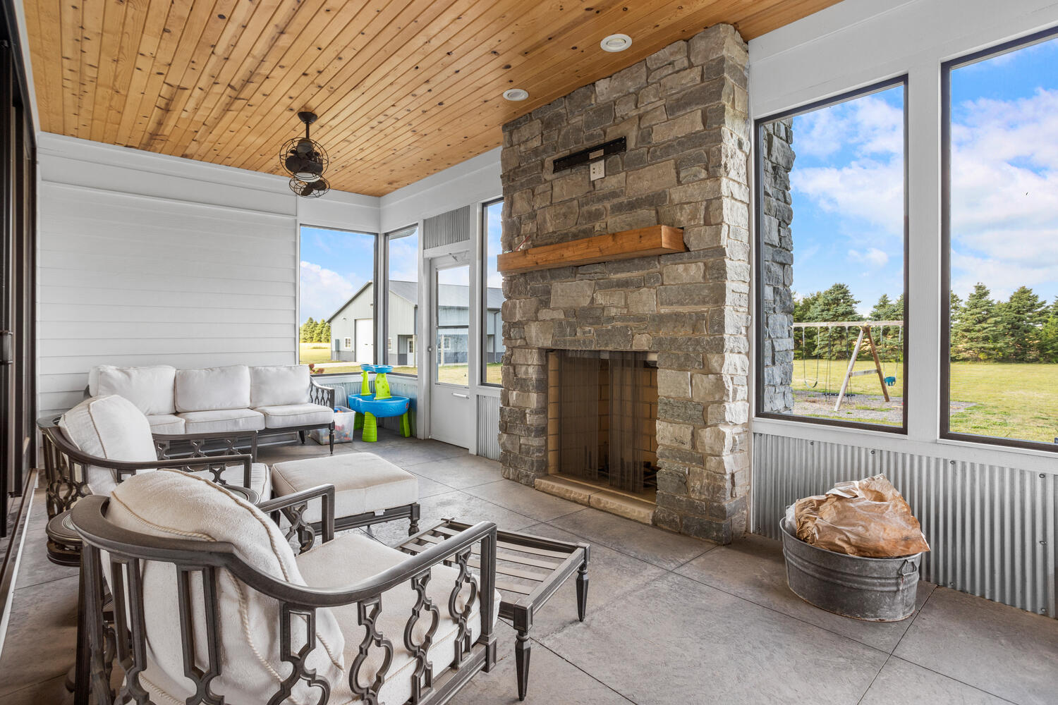 1335 2250 East St. Joseph, IL 61873 - Photo 29 of 68 a living room with furniture and a fireplace