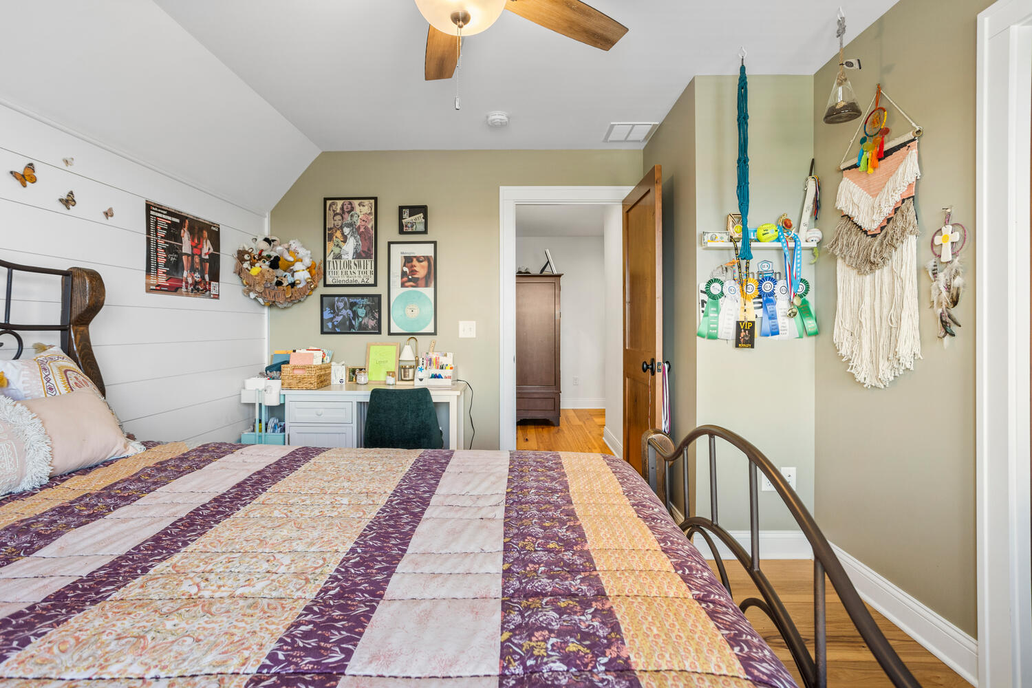 1335 2250 East St. Joseph, IL 61873 - Photo 44 of 68 a bedroom with a large bed and a chandelier