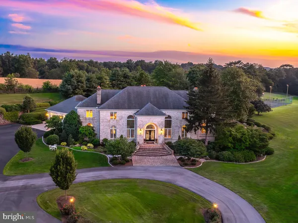 an aerial view of a house with a garden