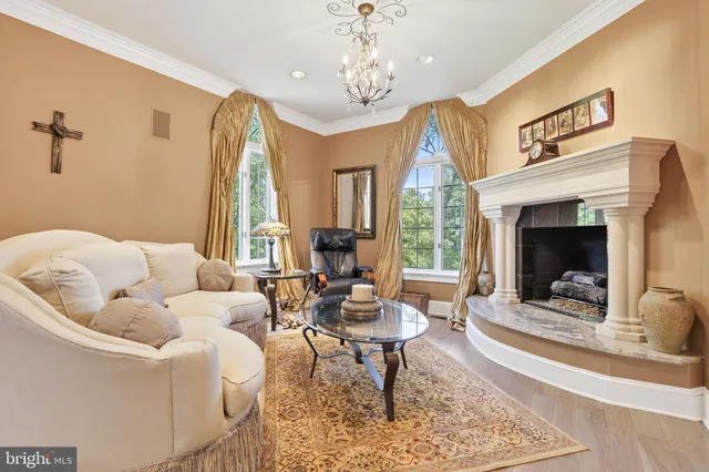 a picture of a room with a white wall and a refrigerator