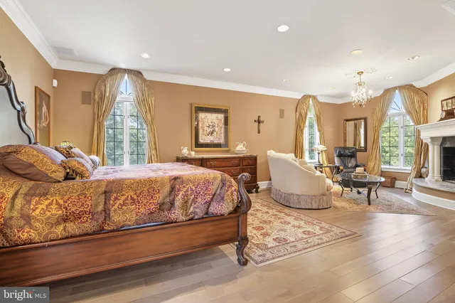 an aerial view of residential houses with outdoor space and river